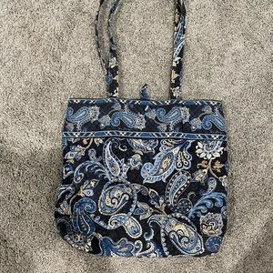 Blue Vera Bradley Tote with pocket on inside.